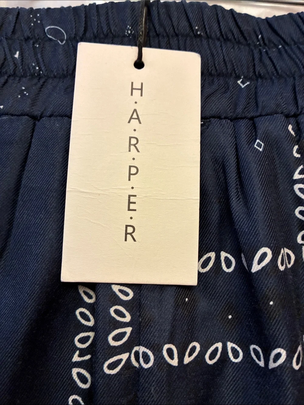 Harper Navy Blue Midi Skirt with bandana or paisley print pattern. It has lining